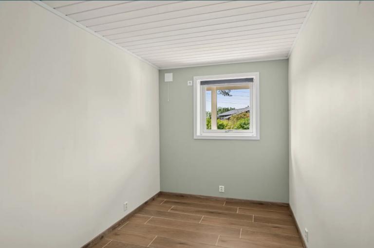 Soverom med plass til dobbeltseng